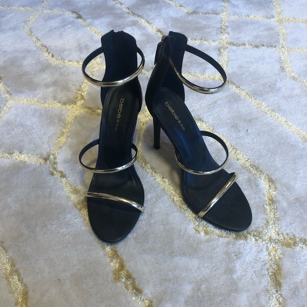 Bebe black and gold strappy heels NWOT
